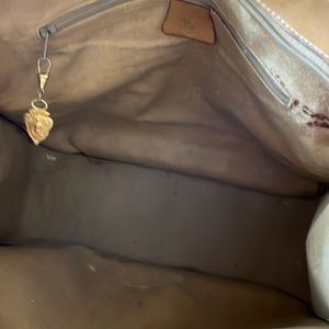 Gucci handbag 30 x 30 x 5 with handles and strap. Gold hardware.